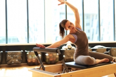 Attractive brunette in pilates class