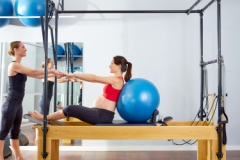 pregnant woman pilates reformer fitball exercise